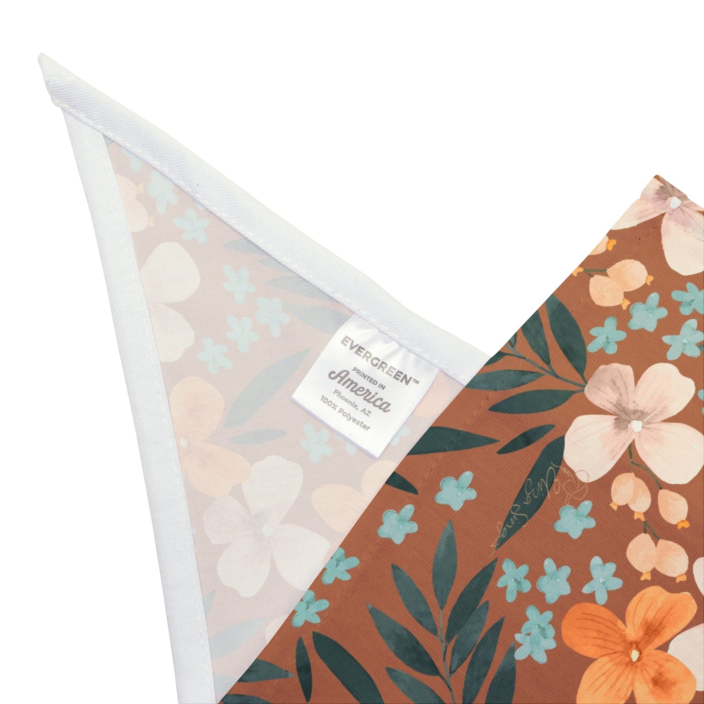 Embrace the beauty of fall with our Autumn Bloom Dog Bandana/Wild Rag. The brown background adorned with painted daisy-style flowers in orange, beige, blue, and green adds a touch of warmth to your pup's ensemble. Crafted from soft-spun polyester, this wild rag ensures comfort and style during every outdoor escapade. Available exclusively at Eliza Singer.