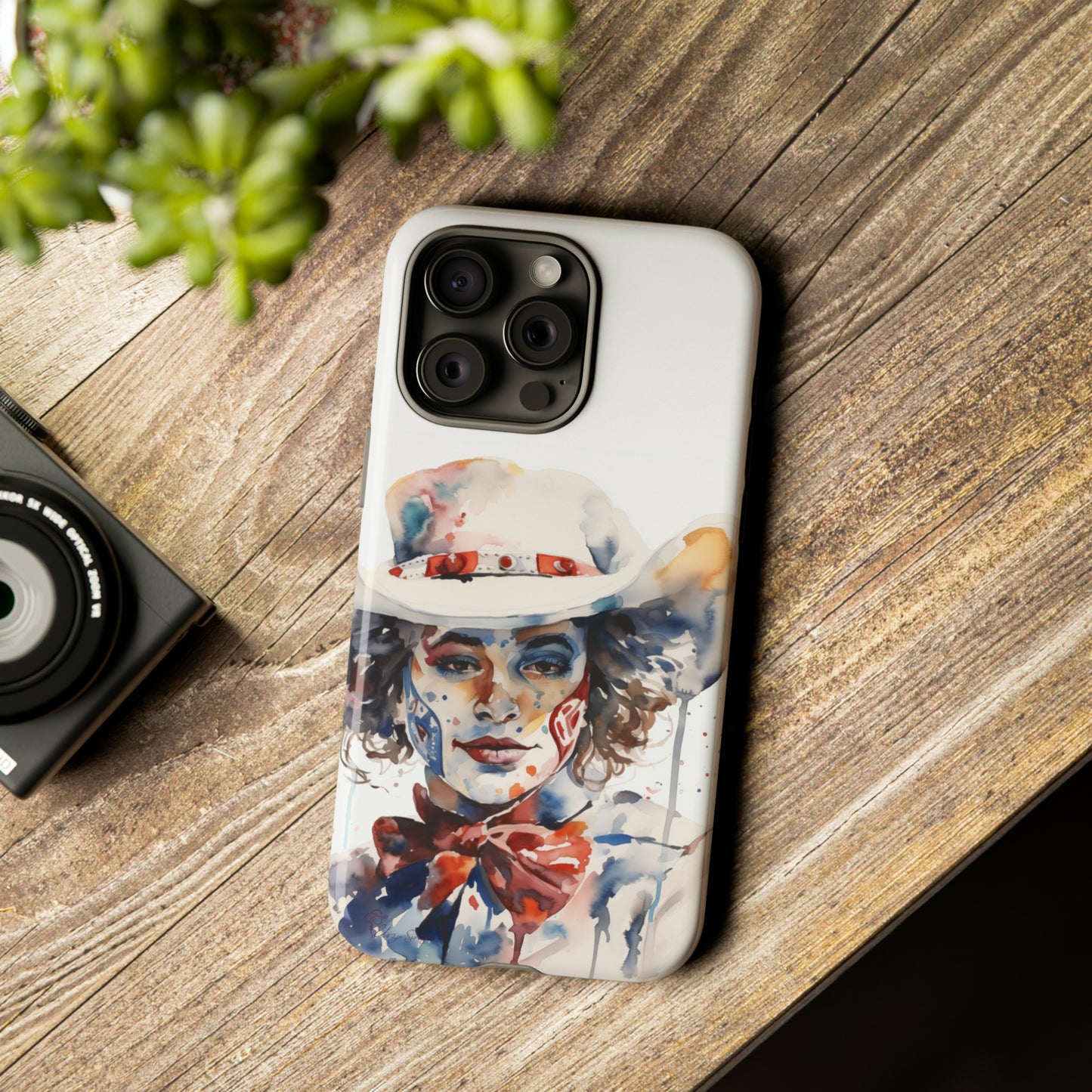 Presenting our Tough Western Cell Phone Case: Rodeo Clown Watercolor Gal Edition! This one-of-a-kind design showcases a vibrant watercolor portrayal of a woman as a rodeo clown on a white background. Enjoy the fusion of artistry and robust phone protection.