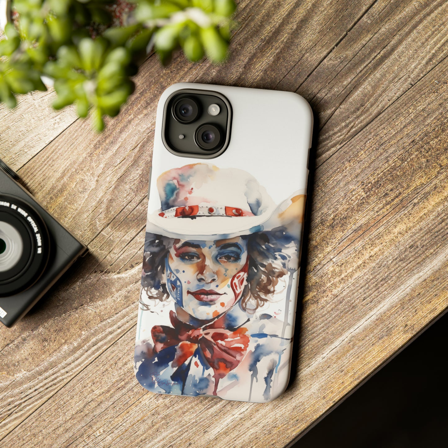 Presenting our Tough Western Cell Phone Case: Rodeo Clown Watercolor Gal Edition! This one-of-a-kind design showcases a vibrant watercolor portrayal of a woman as a rodeo clown on a white background. Enjoy the fusion of artistry and robust phone protection.