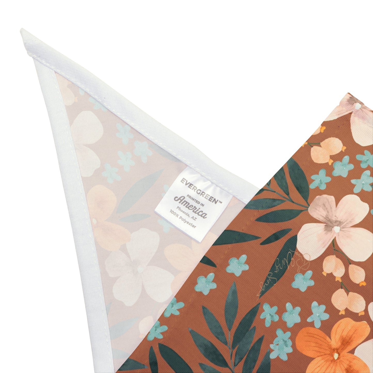 Embrace the beauty of fall with our Autumn Bloom Dog Bandana/Wild Rag. The brown background adorned with painted daisy-style flowers in orange, beige, blue, and green adds a touch of warmth to your pup's ensemble. Crafted from soft-spun polyester, this wild rag ensures comfort and style during every outdoor escapade. Available exclusively at Eliza Singer.