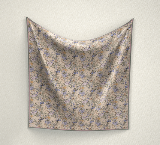 Elevate your vintage style with our Vintage Blossoms Wild Rag. Crafted from luxurious satin silk, this 100x100 cm wild rag features delicate blossoms in soft, muted colors such as beige, lilac, and muted greens. Enhance your wardrobe with this timeless piece.